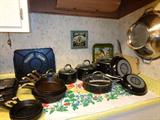 Cast iron skillets, cornbread pans, Kitchen Aid new cookware set