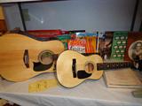 Small one: Mark II student acoustic guitar w/ case, Large one :Washburn Lyon acoustic guitar w/ digital tuner w/ case