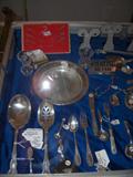 A view of some of the sterling items incl. Tiffany sterling sword cocktail skewers in red box.