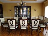 Banquet size (or smaller) Thomasville dining table, 10 chairs, china cabinet