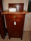 one of two marble top inlaid work night stand
