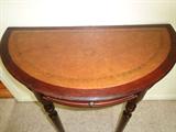 Half moon table with leather top