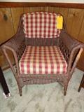 Antique wicker arm chair