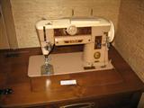 Nice Singer Sewing Machine in
Walnut Cabinet