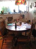 Nice Oak Round Dining Table
with 4 chairs.