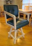 Swivel counter height arm chairs, hunter green vinyl seats and backs