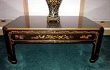 Oriental black lacquer coffee table from Plunketts.  Decorated with scenes, flowers, birds, etc.