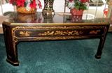 Oriental black lacquer coffee table from Plunketts.  Decorated with scenes, flowers, birds, etc.