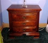 Night stand with 3 drawers and slide out shelf by Manor House.  