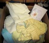 Infant blankets, sweaters, hats, etc.  Hand made.