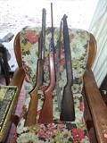 2 pellets guns and a WW1 Springfield rifle stock, with army strap