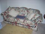 floral upholstered sofa