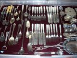 lots of sterling and sterling flatware