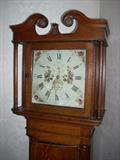 great face on this English tall case clock