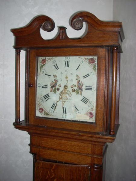 great face on this English tall case clock