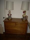 antique dresser and man/woman bust lamps