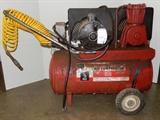 Sears  7 1/2 gallon air compressor; Features a 7 1/2 gallon tank and 1/2Hp motor. Comes with hose and dust gun(new in the plastic). The power cord is cracked, but compressor does run