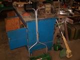 Push mower, blue cabinet