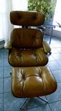 Eames-Style Reproduction Tan Leather Chair & Ottoman. Tan leather upholstery, maple wood & Chrome. 