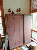Tall buttermilk red primitive cupboard