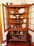 Large primitive corner cabinet with french glass doors