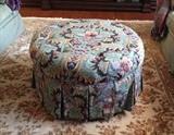 Matching round ottoman on wheels