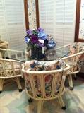                        glass top table/4 rolling chairs