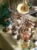                         various sizes of hurricane lamps