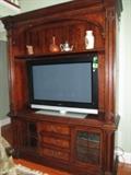 ENTERTAINMENT CENTER ON OVERSIZED PIER BASE
WALTER E. SMITHE FURNITURE COMPANY
