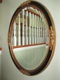 DECORATIVE MIRROR
BLACK OVAL WITH GOLD ACCENTS BEVELLED MIRROR
