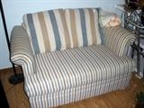 This love seat is also a sleeper, twin-size.