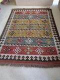 Wool rug sought after color scheme 