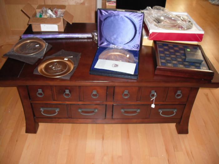 Asian coffee table, collectible plates, board game