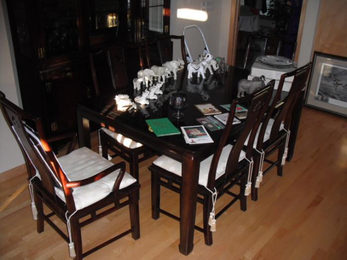 Asian dining table with 2 leaves and 6 chairs; Lenox porcelain elephants