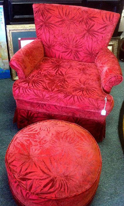 upholstered red chair and ottoman