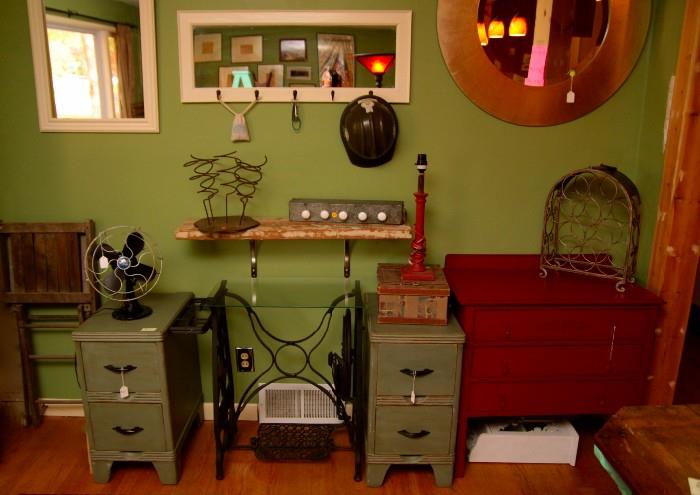 Assorted handpainted mirrors, handpainted vintage wooden cabinets, hand-painted wood matching end tables, antique sewing machine base and much more.
