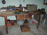 Hand tools, large bench vise, work bench