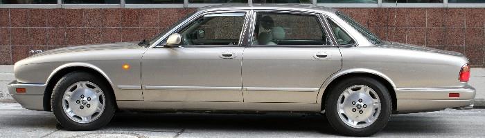 Lot#1, JAGUAR XJ6, 1995, FOUR-DOOR SEDAN,1995 Jaguar XJ6, four door sedan having champagne exterior color, fine leather interior which matches exterior, along with burlwood appointments in cockpit, front and rear. Less than 50,000 original miles. 4.0 liter inline six cylinder,  245 HP engine. Four speed automatic transmission with overdrive with shifter mounted in center console. From the Nager estate of Bloomfield Township, Michigan. Owners manuals in file.