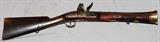 Lot#3, EUROPEAN FLINTLOCK BLUNDERBUSS, 1.00 CAL.,engraved crown over '3' and standing lion figure on lock plate. Barrel is octagonal to round at flared muzzle. Brass overlays on stock at muzzle, brass trigger guard, ram rod rings and butt plate; 2 large sling swivels. C-late 1700's - early 1800's.