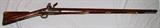 Lot#5,BRITISH - BROWN BESS- THIRD MODEL,Also known as the 'India Pattern." .75 Cal., 38 1/4'' barrel length (may have been cut down from 42'' which was standard length. Iron ramrod, brass hardware. C-1790-early 1800's. Marked: "TOWER / GR (under crown)" on lock plate. Letters "C, S, LA" in front of trigger guard and "L (CA LA?)" on left side of stock.