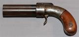 Lot#30, MANHATTAN F. A. MFG. CO., PEPPERBOX REVOLVER, LATE 1850'S L 4" BBL,.31 Cal., 4'' barrel length, six shot double action revolver. Marked: "MANHATTAN F. A. MFG. CO. / NEW YORK" on hammer and "CAST STEEL / 119" on barrel. C-late 1850's, engraved frame and walnut grips.