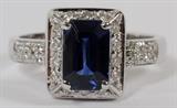 Lot#67, 18 KT WHITE GOLD, NATURAL SAPPHIRE AND DIAMOND RING,18 kt white gold ring with a 1.80 carat natural sapphire center, surrounded by diamonds, with a total weight of 0.60 carats. The total ring weight is 5.5gms.