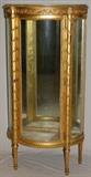Lot#88, LOUIS XVI STYLE GILT WOOD CURIO CABINET H 54" L 27" D 13"Glass paneled door, with two glass shelves, and a mirrored back. 54" H. x 27" L. x 13" D.