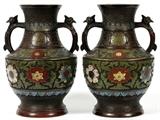 Lot#191, CHINESE CHAMPLEVÉ BRONZE VASES, PAIR H 13", DIA 9"having multi-colored flowers, gargoyle handles, flared rims and bases. Signed on the underside along with a paper label which states in Chinese script with translation: "Ming Dynasty Msuau-te 1426-1435"; Purchased in China by consigner while member of German diplomatic corp.