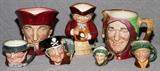 Lot#229, ROYAL DOULTON CHARACTER MUGS & PITCHERS, SEVEN, H 2 1/2"-7"Hand painted porcelain, including "The Cardinal", "Arriet", "Touchstone", "Toby XX", "Tony Weller", "Long John Silver", and "Auld Mac".