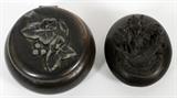 Lot#246, CARVED WOOD AND SILVER PLATE, COMPACTS, 2 PCS., DIA 2 1/2 & 3"One carved wood, one silver/copper compact with leaves.