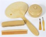 Lot#247, BAKELITE DRESSER SET, 6 PCS,includes on hand mirror, hair brush, comb, covered hair receptacle and two manicure tools.
