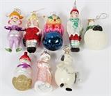Lot#402, RADKO ASSORTED GLASS ORNAMENTS, EIGHT,One Snowman, One Pig, One Santa on the Moon, One Owl, One Santa with Bag, One Astronauts Dog, One Pig, and One Mouse.