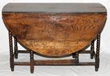 Lot#1014, ENGLISH OAK GATE LEG TABLE, H 30", L 48", D 22" CLOSED.Having demi lune drop leaves and turned legs.
