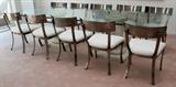 Lot#1103, DESIGN INSTITUTE AMERICA SIDE CHAIRS, SET OF TEN, & GLASS TOP DINING TABLE, H 29", L 120"Including a set of 10 Design Institute of America dining chairs, steel frames with satin finish, together with 1 glass top dining table raised on two columnar supports, H.29" x 120" x 47 1/2". Eleven items total.